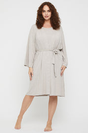 A model wearing the Bamboo Robe in colour Oatmeal, from the front, showing the whole outfit