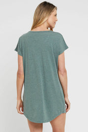 A model wearing the Bamboo Nightie in colour Moss (Green), from the back