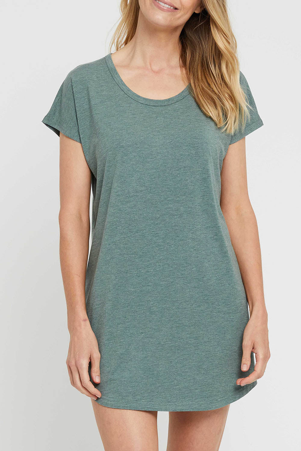 A model wearing the Bamboo Nightie in colour Moss (Green), from the front, cropped image