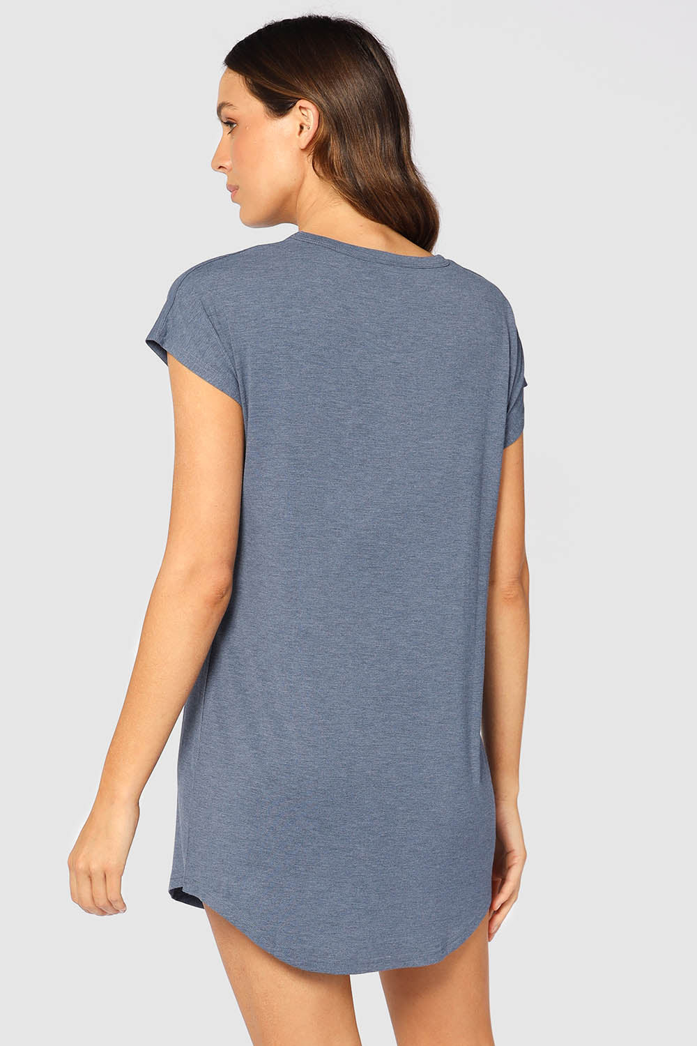 A model wearing the Bamboo Nightie in colour Twilight (Blue), from the back