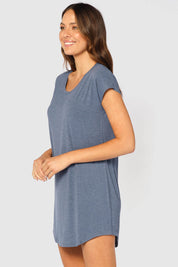 A model wearing the Bamboo Nightie in colour Twilight (Blue), from the front, cropped image