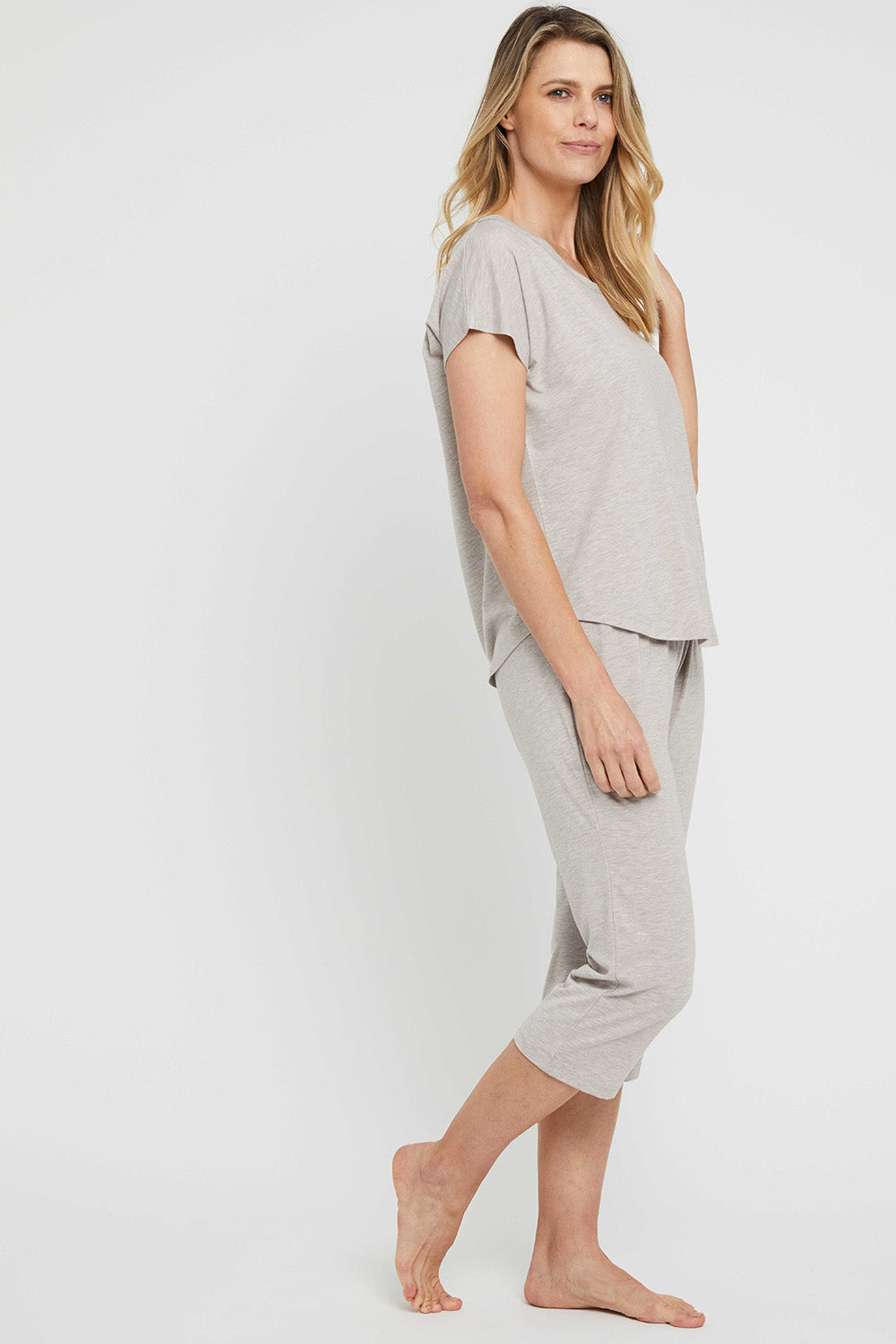 A model wearing the 3/4 Bamboo PJ Pant in colour Oatmeal, from the front, showing the whole outfit