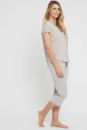 A model wearing the 3/4 Bamboo PJ Pant in colour Oatmeal, from the front, showing the whole outfit
