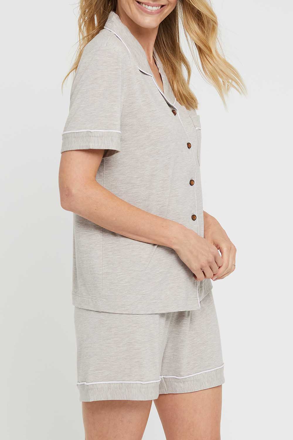A model wearing the Bamboo PJ Set in colour Oatmeal, from the front, cropped image