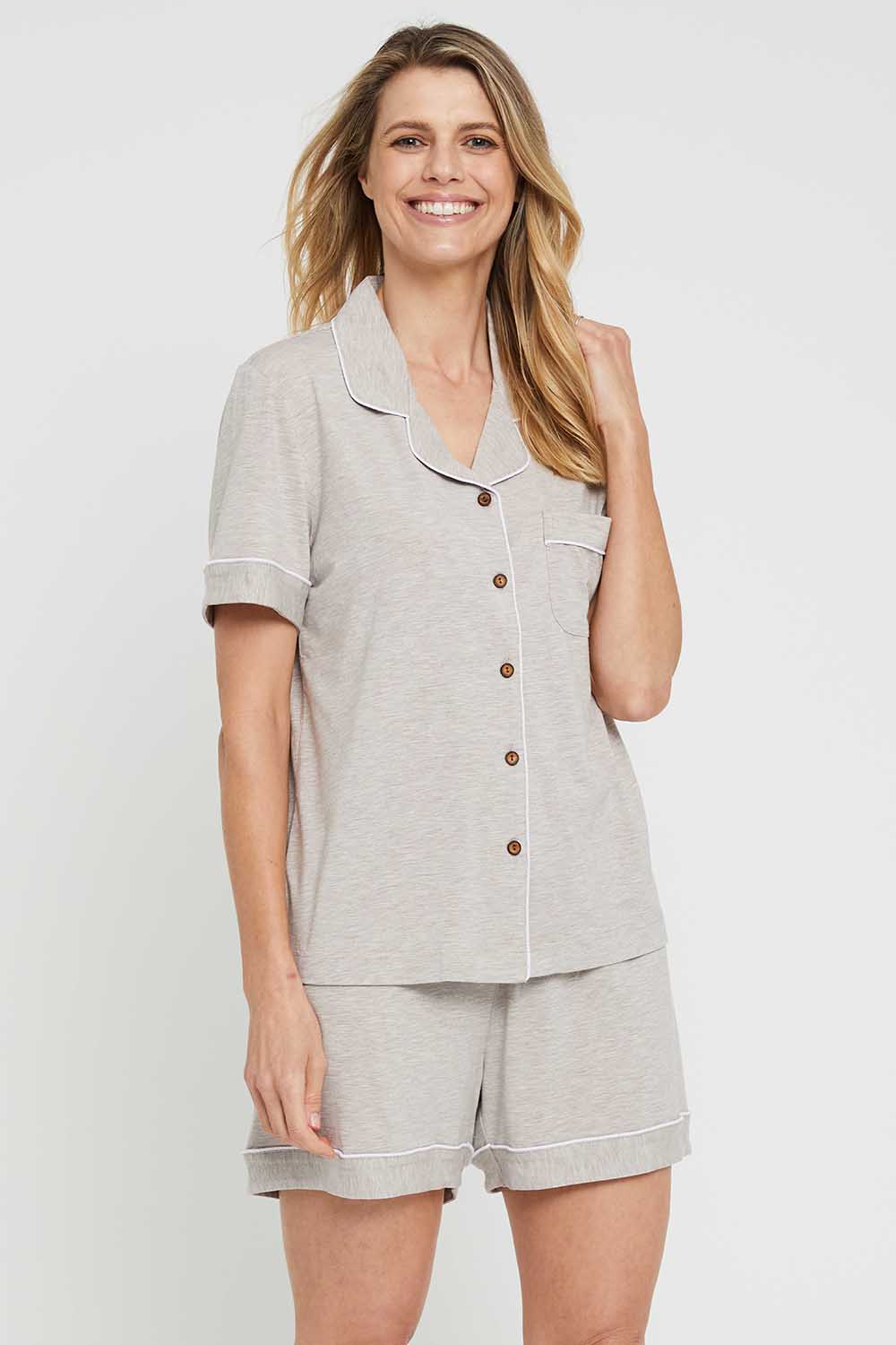 A model wearing the Bamboo PJ Set in colour Oatmeal, from the front, cropped image