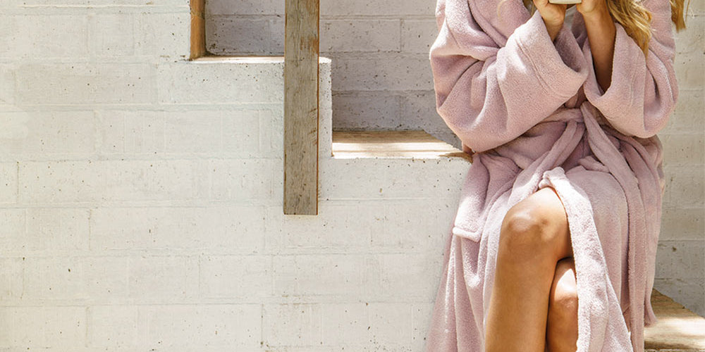 A model wearing the Microplush Bath Robe in colour Blush (Pink), from the front, showing the whole outfit