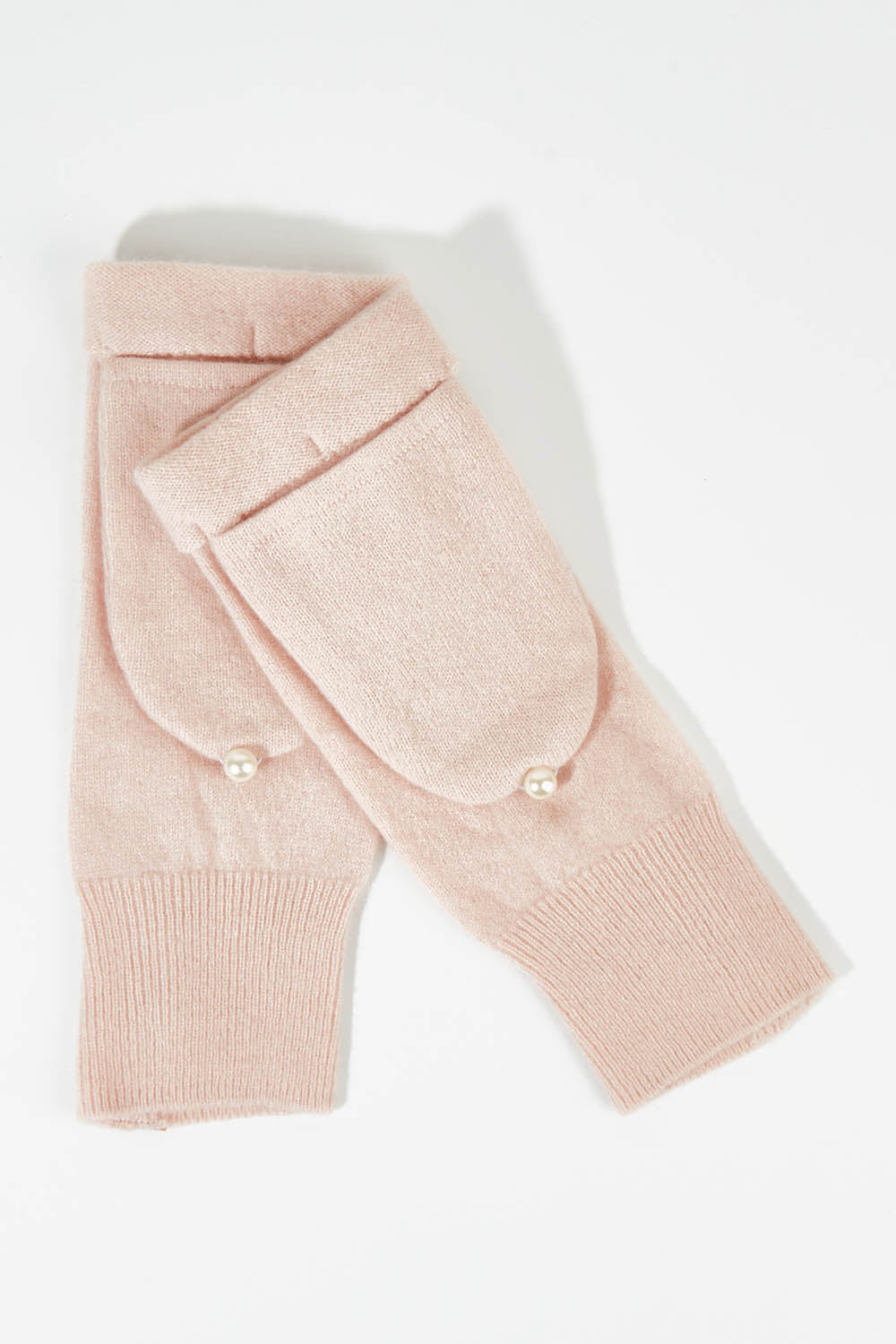 A model wearing size OneSize of the Upcycled Cashmere Hooded Fingerless Gloves in colour Babypink (Pink), from the front, showing the whole outfit