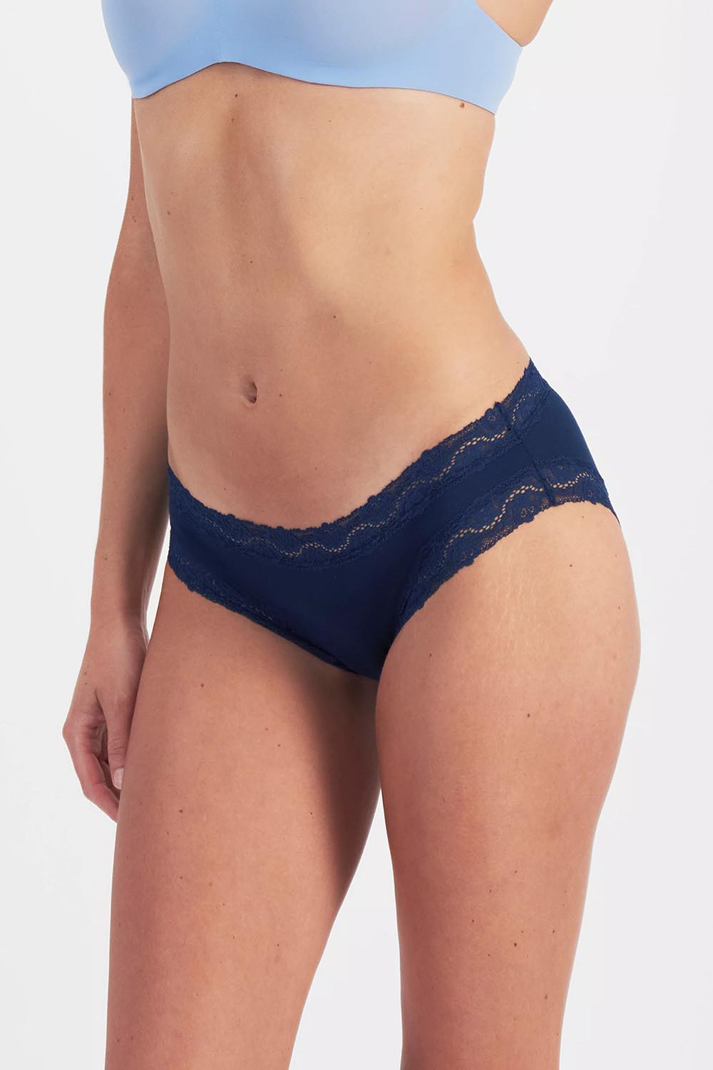 Model Genericm wearing size sample of the Marais Cotton Bikini - Darksapphire in colour Darksapphire, from an angle