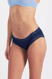Model Genericm wearing size sample of the Marais Cotton Bikini - Darksapphire in colour Darksapphire, from an angle
