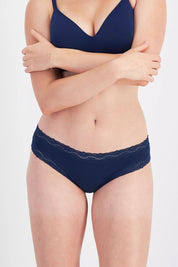 Model Genericm wearing size sample of the Marais Cotton Bikini - Darksapphire in colour Darksapphire, in a cropped view