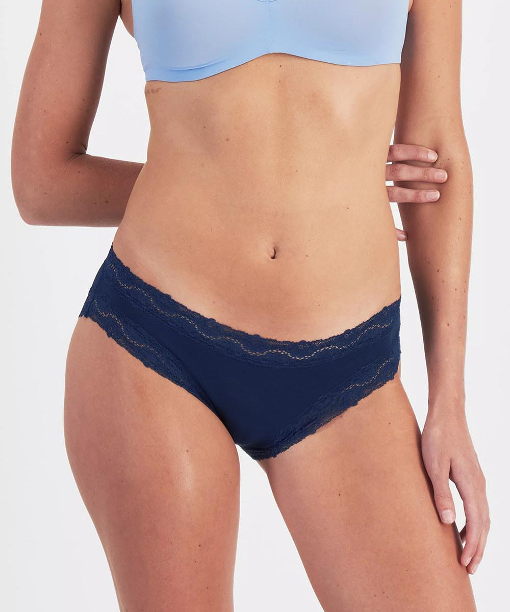 Model Genericm wearing size sample of the Marais Cotton Bikini - Darksapphire in colour Darksapphire, in a cropped view