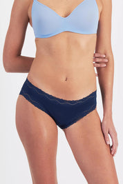 Model Genericm wearing size sample of the Marais Cotton Bikini - Darksapphire in colour Darksapphire, in a cropped view