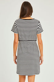 Model Elhana wearing size 10 of the Milla Tin colourShirt Dress - Blkstripe (Black), from the back