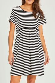 Model Elhana wearing size 10 of the Milla Tin colourShirt Dress - Blkstripe (Black), from the front, cropped image