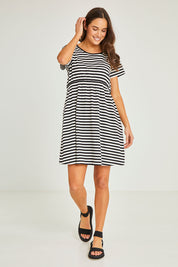 Model Elhana wearing size 10 of the Milla Tin colourShirt Dress - Blkstripe (Black), from the front, showing the whole outfit