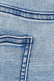Product shot of the Avici Denim Skirt in colour Lightsky (Blue), detail