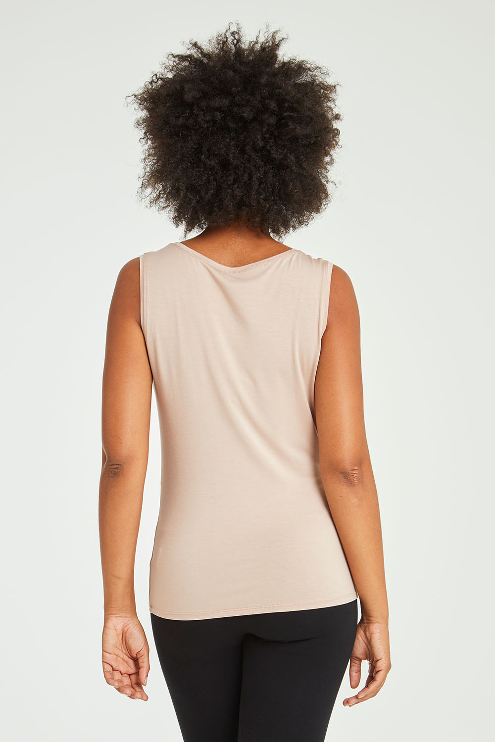 Model Olivia wearing size 10 of the Liza Tank in colour Nude, from the back