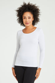Model Olivia wearing size 10 of the Kelli Long Sleeve Top in colour White (White), from the front, cropped image