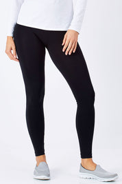 Model Anna wearing size S of the Betty Full Length Legging in colour Black (Black), from the front, cropped image