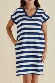 A model wearing the Zena Cotton Tin colourShirt Dress - Navystripe (Blue), from the front, cropped image