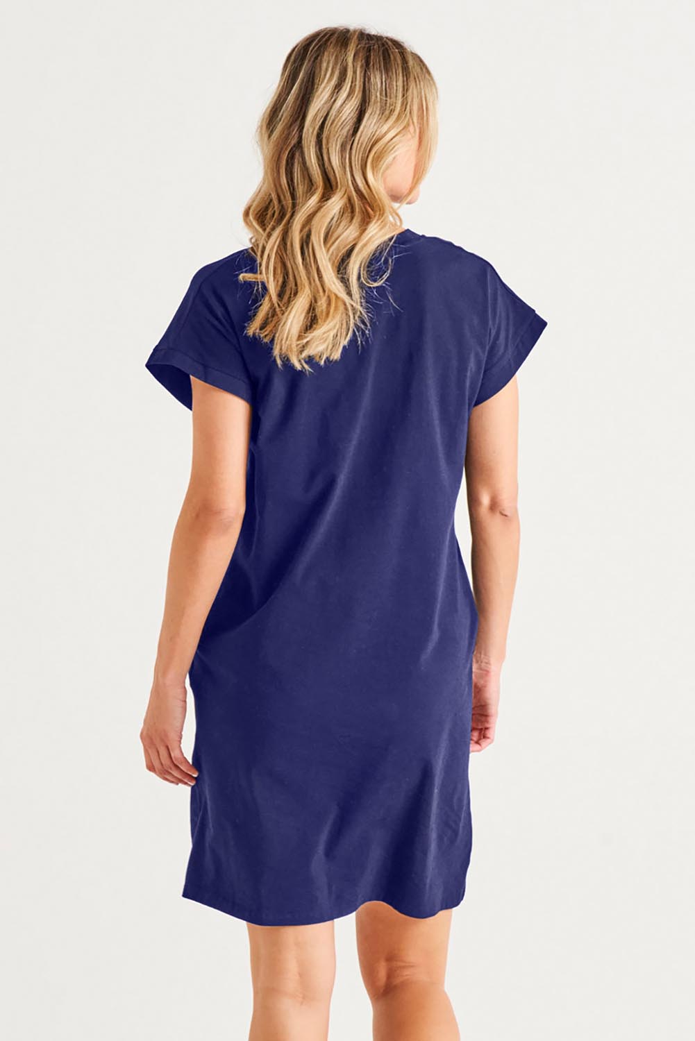 A model wearing the Zena Cotton Tin colourShirt Dress - Ashblue (Blue), from the back