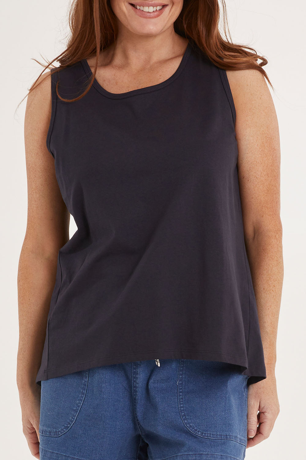 Model Sally wearing size 10 of the Josie Tank in colour Coal (Black), from the front, cropped image