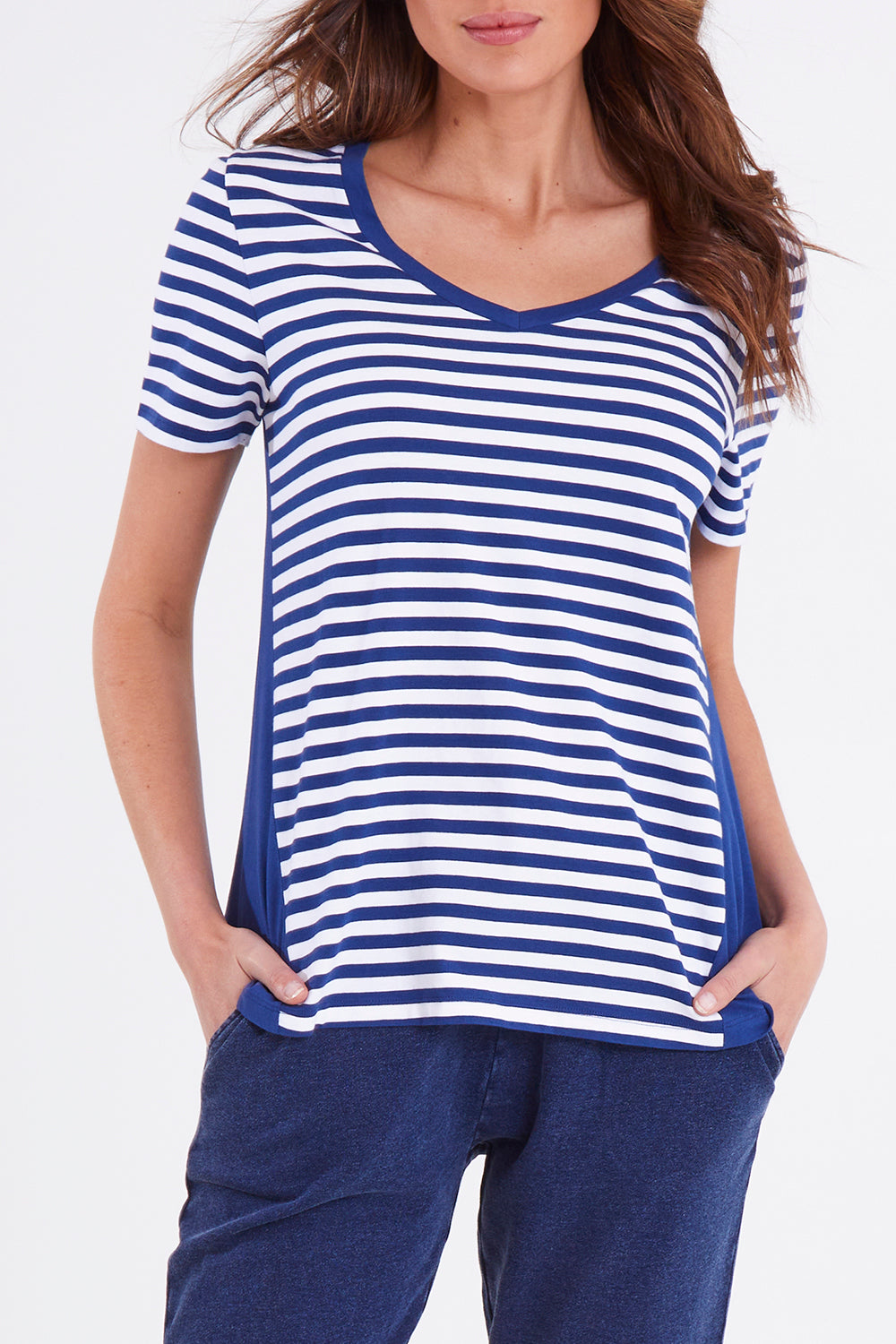 Model Madeline wearing size 10 of the Luella Tee in colour Oceanstrip (Blue), from the front, cropped image