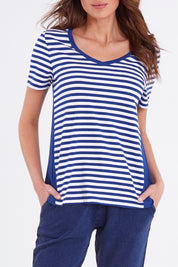 Model Madeline wearing size 10 of the Luella Tee in colour Oceanstrip (Blue), from the front, cropped image