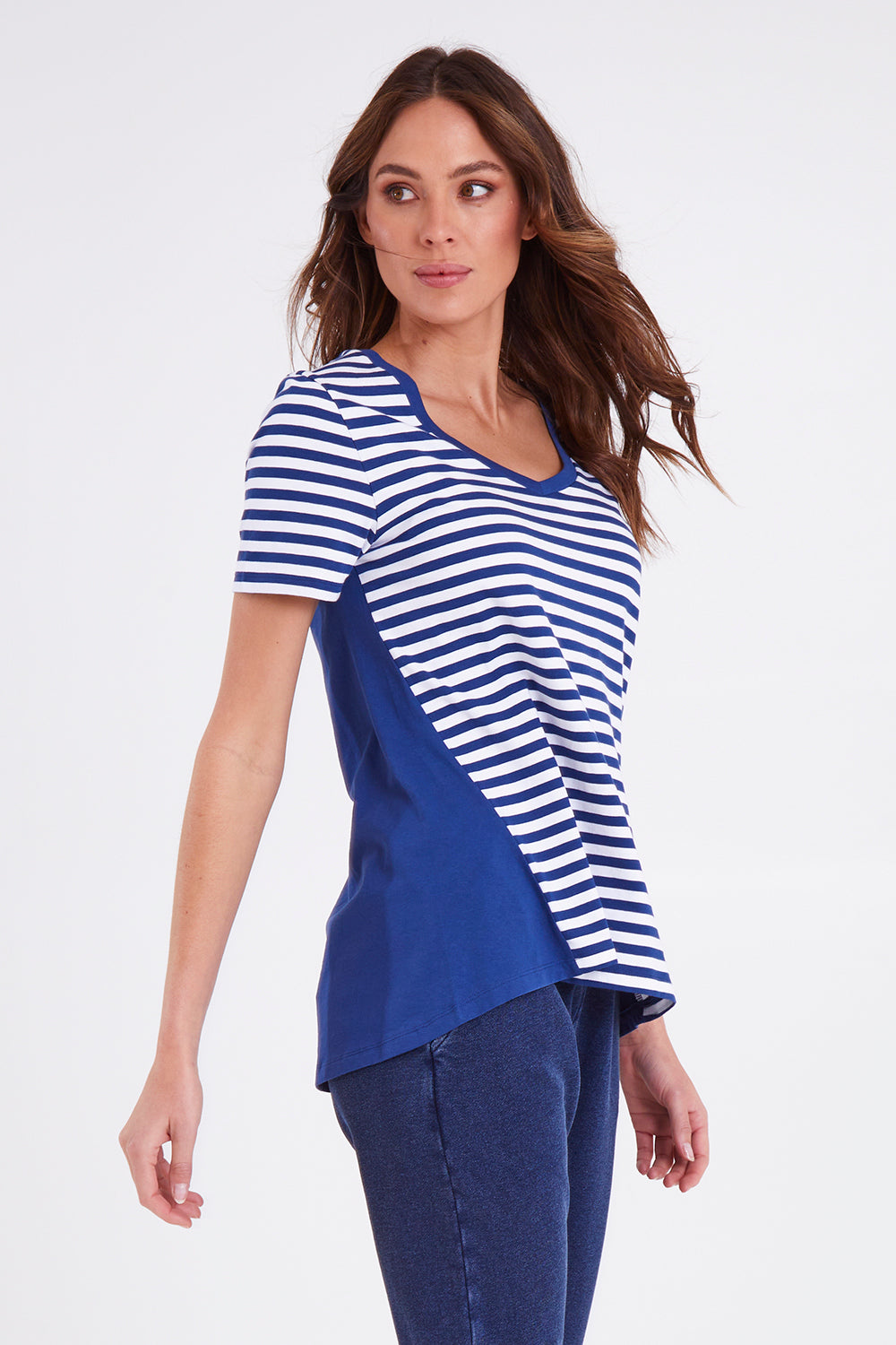 Model Madeline wearing size 10 of the Luella Tee in colour Oceanstrip (Blue), from the front, cropped image