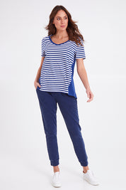 Model Madeline wearing size 10 of the Luella Tee in colour Oceanstrip (Blue), from the front, showing the whole outfit