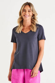 A model wearing the Luella Australian Cotton Tee in colour Coal (Black), from the front, cropped image
