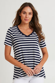 Model Madeline wearing size 10 of the Luella Australian Cotton Tee in colour Navystripe (Blue), from the front, cropped image