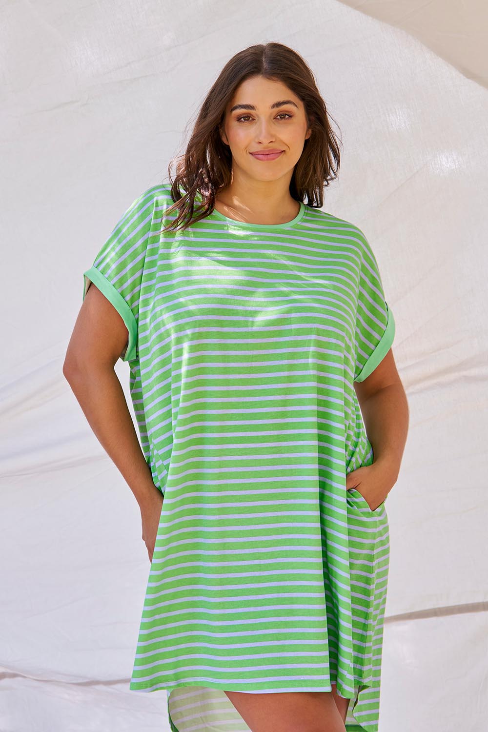 A model wearing the Maxine Australian Cotton Tin colourShirt Dress - Grnteastr (Green), from the front, showing the whole outfit