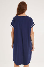 Model Sally wearing size 10 of the Maxine Tin colourShirt Dress - Oceanstrip (Blue), from the back
