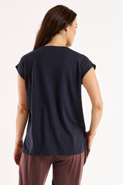 A model wearing the Michaela Australian Cotton Top in colour Coal (Black), from the back