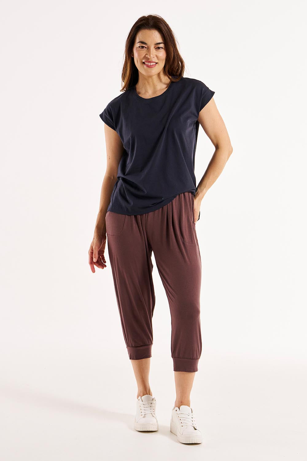A model wearing the Michaela Australian Cotton Top in colour Coal (Black), from the front, showing the whole outfit