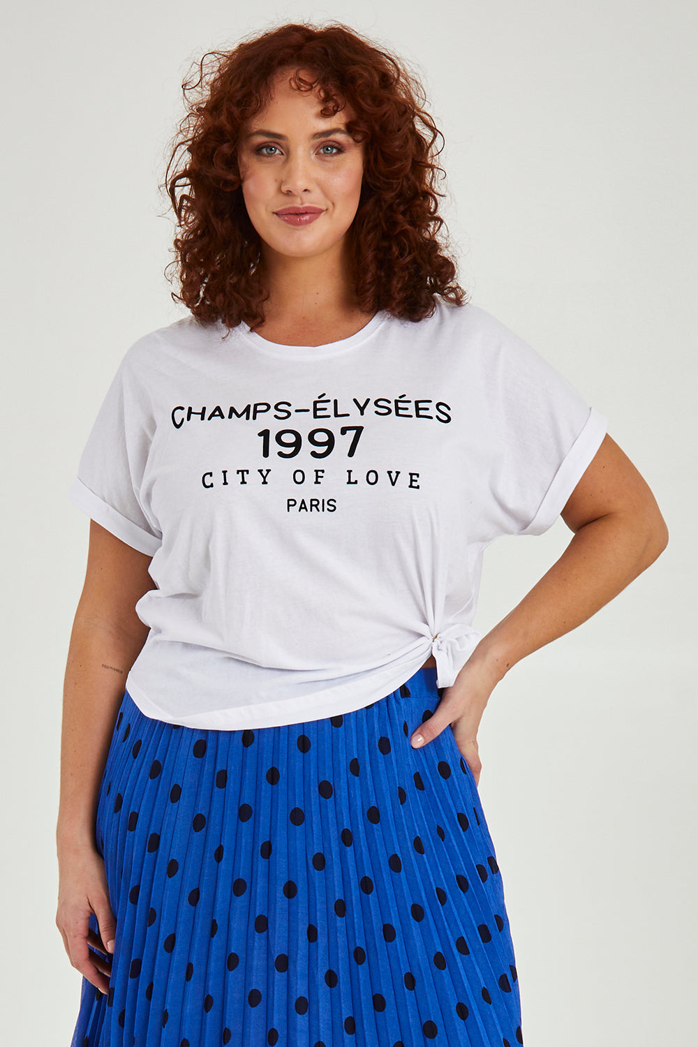 Model Maddy wearing size 16 of the Avril Print Tee in colour White (White), from the front, cropped image