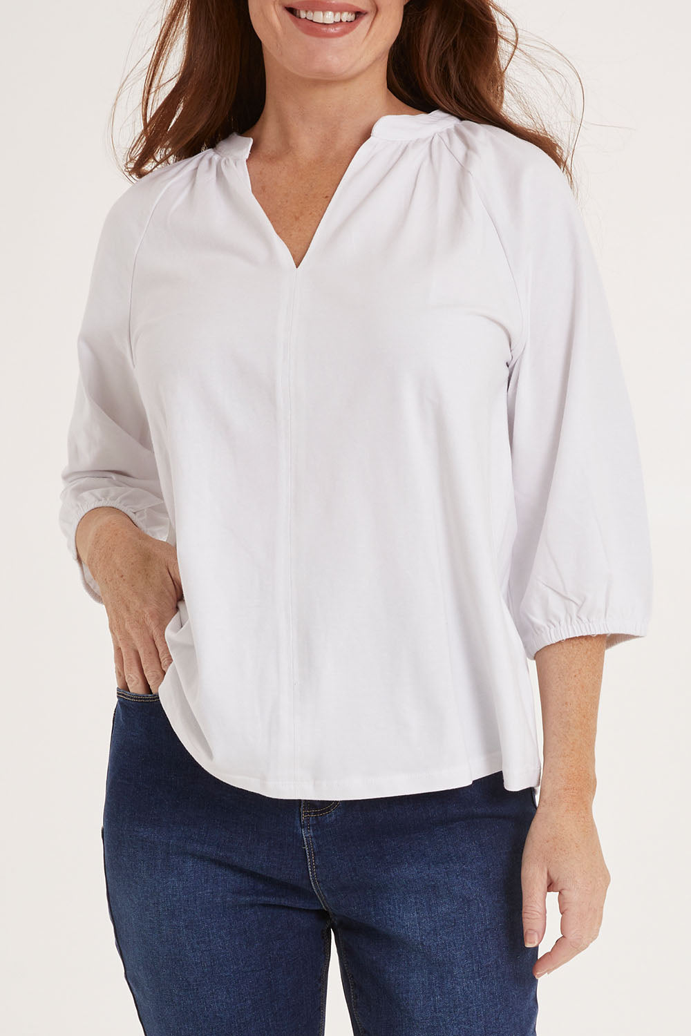 Model Sally wearing size 10 of the Prue Tee in colour White (White), from the front, cropped image