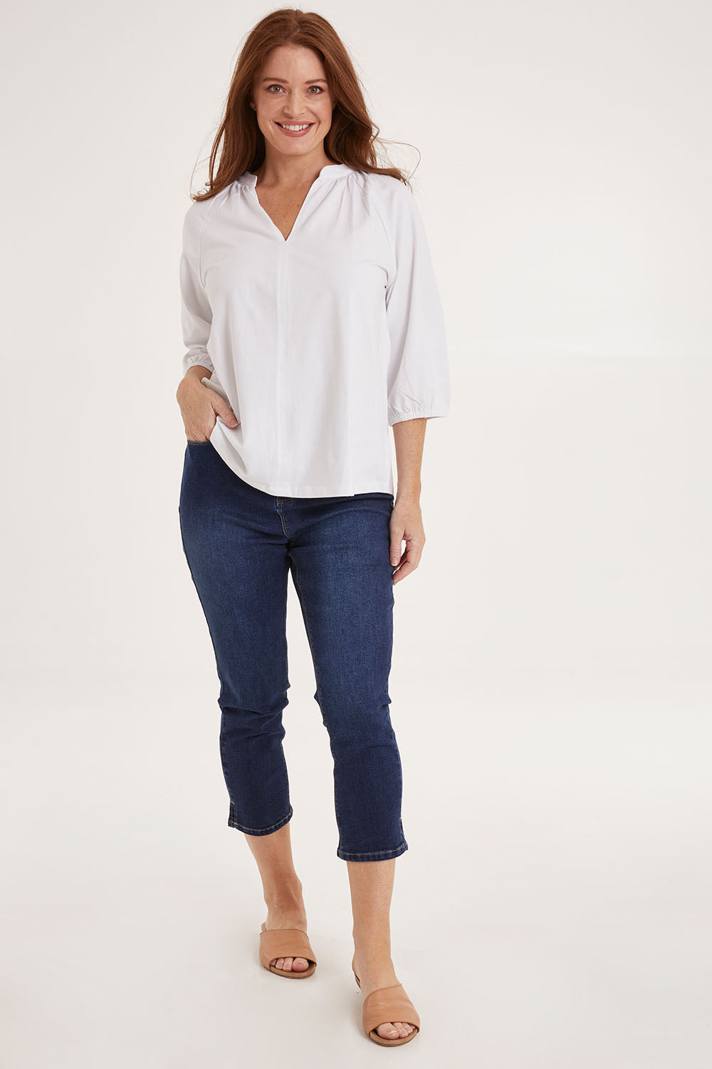 Model Sally wearing size 10 of the Prue Tee in colour White (White), from the front, showing the whole outfit