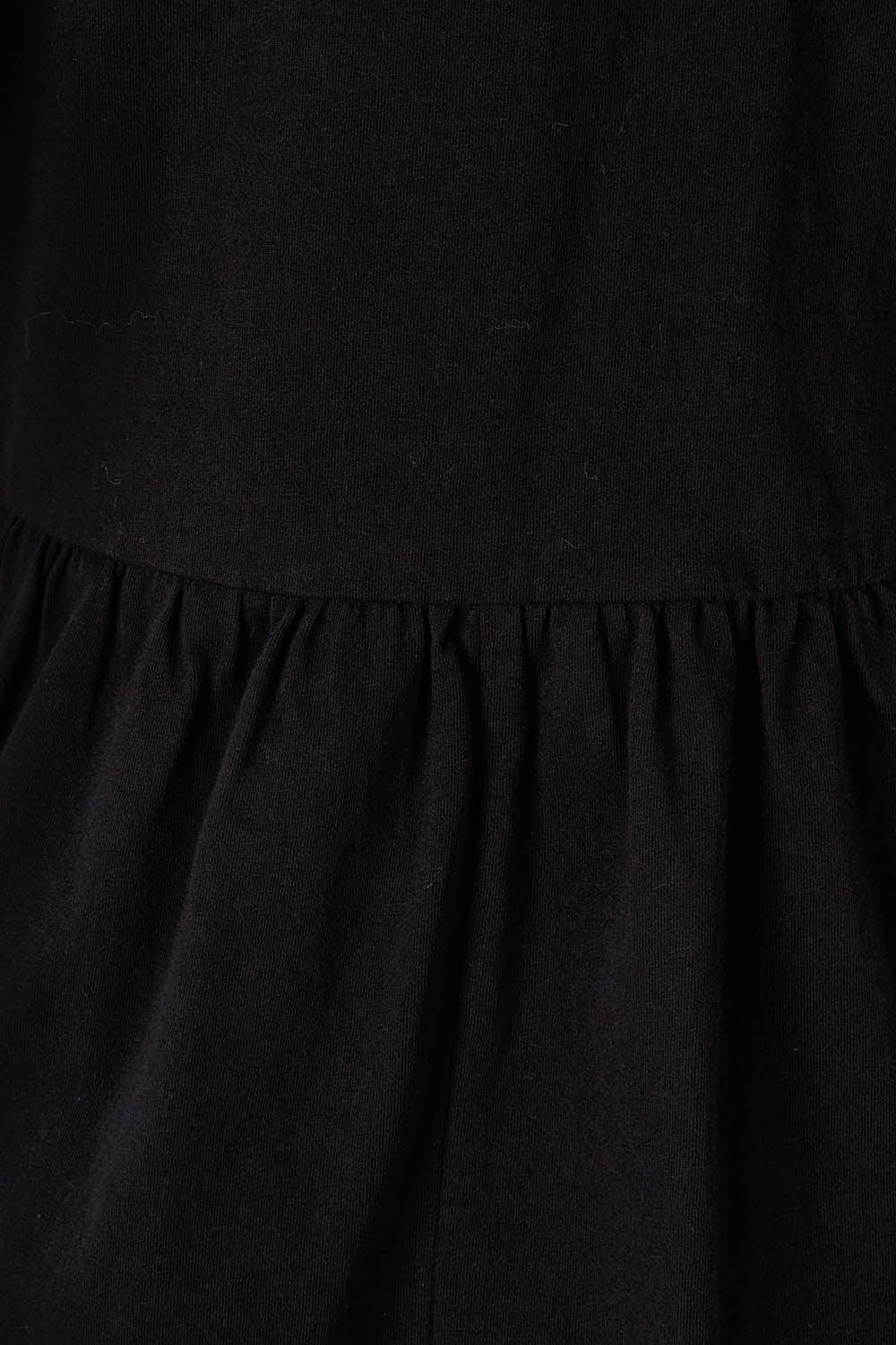 Product shot of the Celia Tee in colour Black (Black), detail