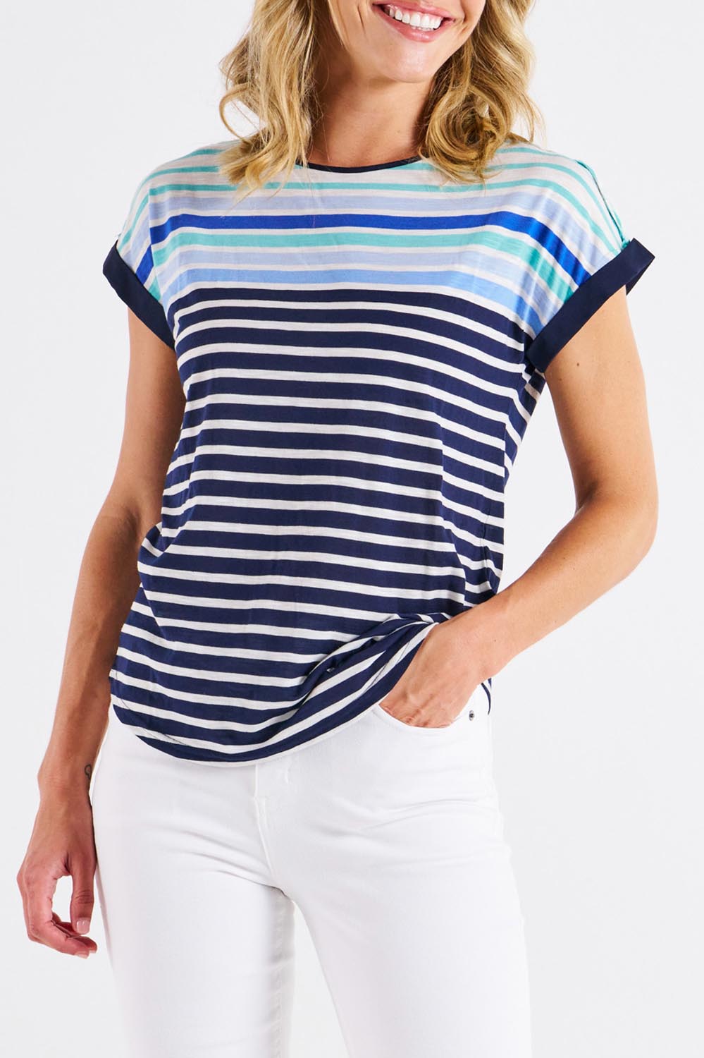A model wearing the Gracie Cotton Tee in colour Bluehaze (Blue), from the front, cropped image