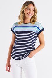 A model wearing the Gracie Cotton Tee in colour Bluehaze (Blue), from the front, cropped image