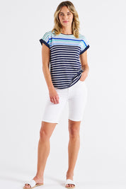 A model wearing the Gracie Cotton Tee in colour Bluehaze (Blue), from the front, showing the whole outfit