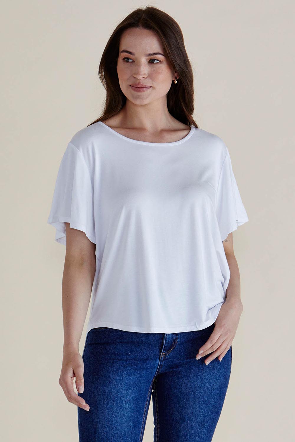 A model wearing the Everleigh Bamboo Tee in colour White (White), from the front, cropped image