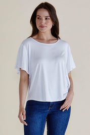 A model wearing the Everleigh Bamboo Tee in colour White (White), from the front, cropped image