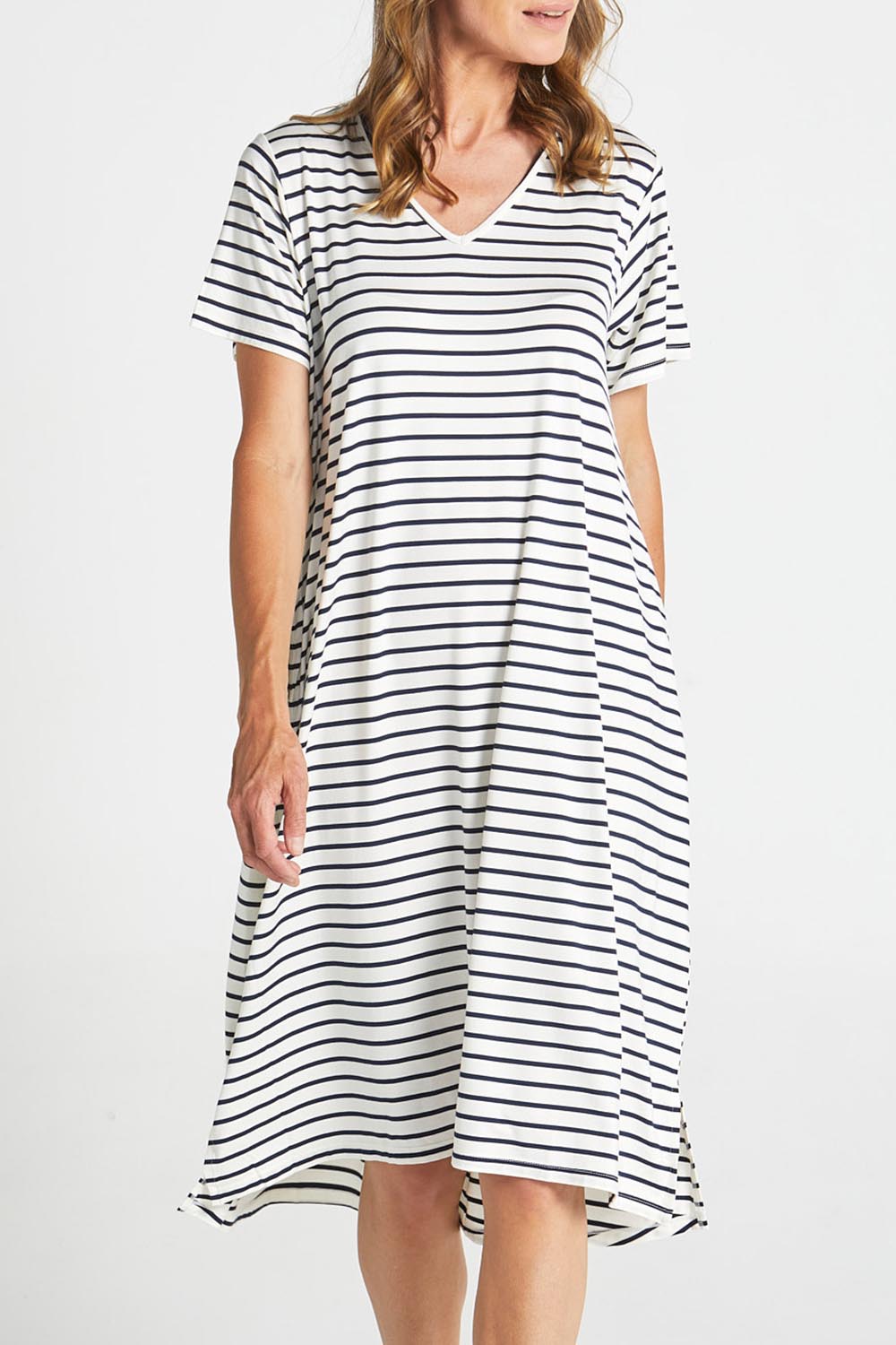 A model wearing the Irena Bamboo Tin colourShirt Dress - Navystripe (Blue), from the front, cropped image