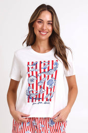 Model Madelinec wearing size 10 of the Ellia Crew Tee – Sunsea in colour Sunsea, in a cropped view