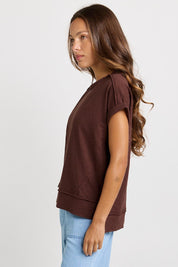 Model Genericm wearing size sample of the Shirley Short Sleeve Tee – Chocolate in colour Chocolate, from an angle