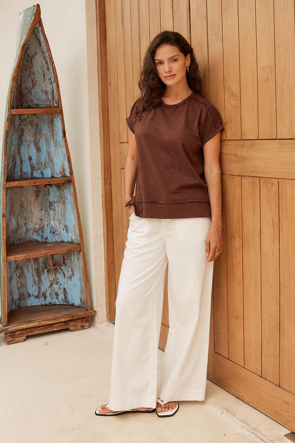 Model Genericm wearing size sample of the Shirley Short Sleeve Tee – Chocolate in colour Chocolate, from the front