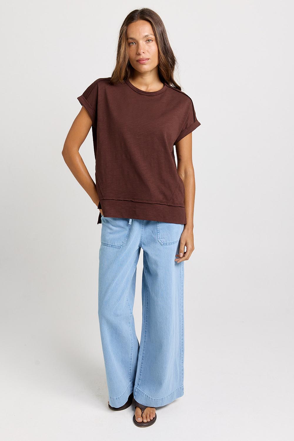 Model Genericm wearing size sample of the Shirley Short Sleeve Tee – Chocolate in colour Chocolate, from the front